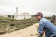 © Lupe Rodríguez/Stocksy - man drinking a cup of coffee outdoors