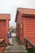© Lupe Rodríguez/Stocksy - young man drinking coffee in a wooden cabin