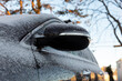 © Raymond Forbes LLC/Stocksy - Car Covered in Light snow frost with side view mirror