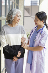  consulting female patient about pills and discussing health treatment sitting in the office at the desk. Medicine and health care concept. Doctor prescribing medicine to patient in the office.