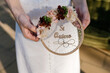 © Ezequiel Giménez/Stocksy - Crop bride showing wedding inscription