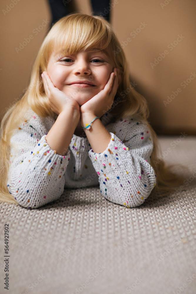 Little Girl Lying on Floor and Smiling Stock Photo | Adobe Stock