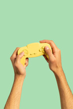 Hands Holding Gaming Gamepad Controller 