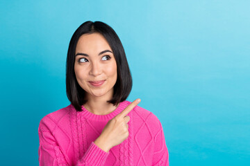 Sticker - Portrait of nice cute person look indicate finger empty space proposition isolated on blue color background