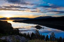 A Magnificent Sunrise Over Emerald Bay With Clouds Reflecting In The Calm Water In Lake Tahoe, CA.