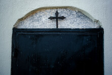 A Cross Over A Door.