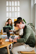 © Nuria Seguí/Stocksy - Focused Man Working In Office
