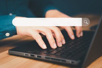 Poster - Mature man hand working with laptop computer on table in his home. Search the Internet with an empty search bar. Best SEO search networking, Searching browsing internet data information concept.
