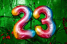 Number 23 On A Green Sequin Fabric