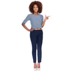 Wall Mural - full length shot of a beautiful young african woman is smiling and pointing to copyspace isolated on