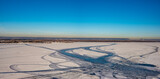 Fototapeta Na ścianę - Large river shackled by ice