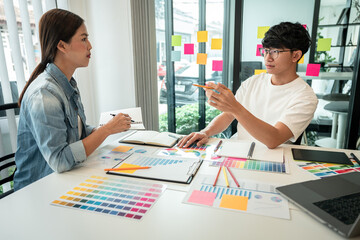 Poster - Team of creative graphic designer working on color swatch samples chart for selection coloring in inspiration to create new collection at workplace