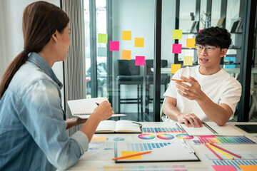 Poster - Two creative graphic designer team working on color selection and drawing on graphic tablet, Color swatch samples chart for selection coloring in inspiration to creativity at workplace