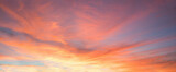 Fototapeta Zachód słońca - colorful sunset sky panorama with pink orange and yellow clouds