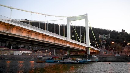 Wall Mural - Liberty Bridge at sunset as seen from a moving boat, Budapest