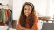 © Nina/peopleimages.com - Ecommerce, fashion and designer at desk, startup girl boss with smile on face and clothing store. Small business success, work from home and young black woman with vision for online shopping company.