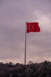 National Flag of Turkey flying on the top of a hill