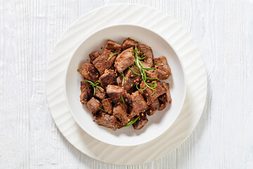 Canvas Print - seared juicy new york strip steak bites