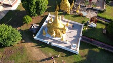 Circulate Aerial View Fly Over Golden Pagoda In One Of Temple In Mae Hong Son, Thailand And Show Beautiful Shape And Design Of Northern Culture In Thailand.