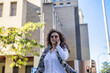 © Nanci - Businesswoman Walking In Financial Area