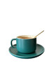 © yzhensiang - Cup of coffee with spoon. Green colour cup cut out