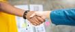 © paulaphoto - Two businesswomen shaking hands. African businesswoman candidate shake hand at meeting, congratulating with getting new job, manager making great deal with customer, diverse business partners
