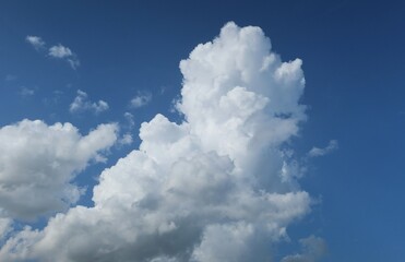 Wall Mural - Beautiful view on blue sky with shaped clouds