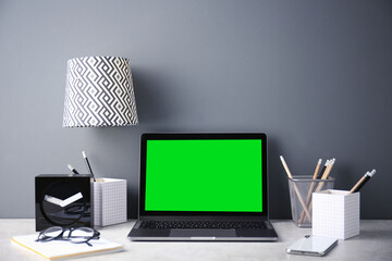 Poster - Laptop display with chroma key. Comfortable workplace in room