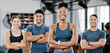 © Jade Maas/peopleimages.com - Fitness, portrait and woman personal trainer with a team standing with crossed arms in the gym. Sports, collaboration and happy people after exercise, workout or training class in sport studio.