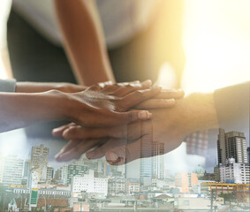 Office, stack of hands and business people in unity, collaboration and celebration for teamwork. City overlay, victory and corporate employees celebrating success or achievement together in workplace