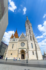 Wall Mural - Matthias Church, a church located in Budapest, Hungary, in front of the Fisherman's Bastion at the heart of Buda's Castle District.	
