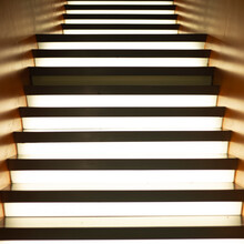 Staircase With Led Lighting Leading Up Indoors, View From Below