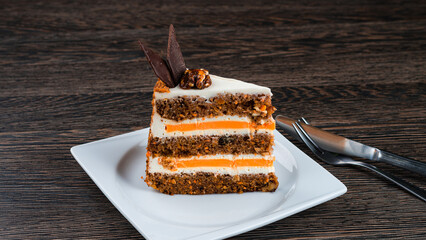 Sticker - Piece of carrot cake with walnuts, decorated with chocolate.