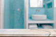 © pedro - Empty marble top table with blurred bathroom interior Background. for product display.