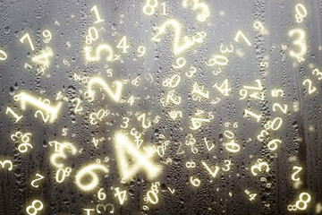 numerology, drops on a misted glass surrounded by numbers