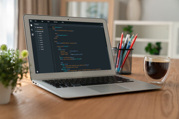 Software development programming on computer screen for modish application and program coding