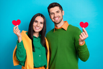 Aufkleber - Photo of lovely lady bearded man nice family wife husband wear trendy clothes showing red paper card isolated on blue color background