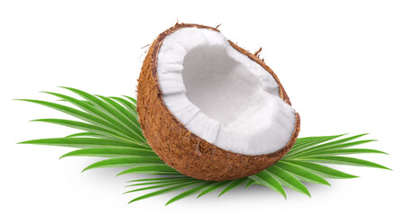 Wall Mural - coconut isolated. half of a coconut on palm leaves on a white background.