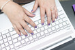 woman typing on laptop 