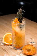 Sticker - Homemade refreshing summer lemonade cocktail with orange juice, crushed ice, rosemary and citrus fruits. Summer healthy drink