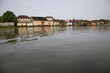 © Cavan Images - Water view of old waterfront houses.