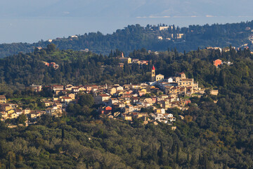 Wall Mural - Corfu island view from Kaiser's Throne observation deck lookout, Pelekas village, Greece, Kaiser William II summit Observatory panoramic summer view with mountains, sea and Kerkyra in a background