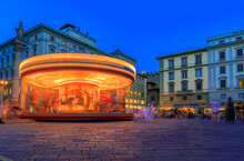 Illuminated Antique Carousel On Piazza Della Republica, Florence Italy At Sunset