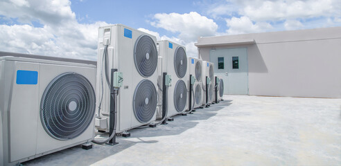 Air conditioning (HVAC) installed on the roof of industrial buildings.