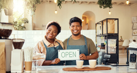 Portrait, couple and open sign by restaurant owners happy at coffee shop or cafe in support together. Partnership, collaboration and team smiling due to startup growth and proud of success or vision