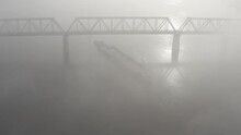 Petrovsky Railway Bridge Over The Dnieper River, Ukraine, Kyiv City. Drone Video. Autumn. Fog. 