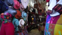 Hats And Colorful Blouses And Clothing In A Tourist Souvenir Shop In Merida, Yucatan, Mexico.
