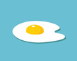 Fried egg flat style. Egg icon on a blue background. Raw egg yolk.