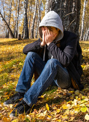 Wall Mural - Sad Young Man outdoor