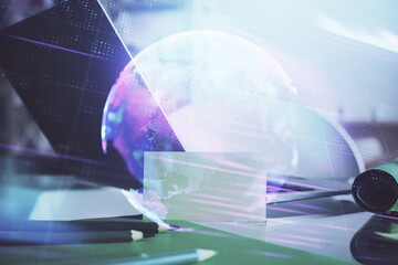 Poster - Computer on desktop in office with technology theme hologram. Multi exposure. Tech concept.